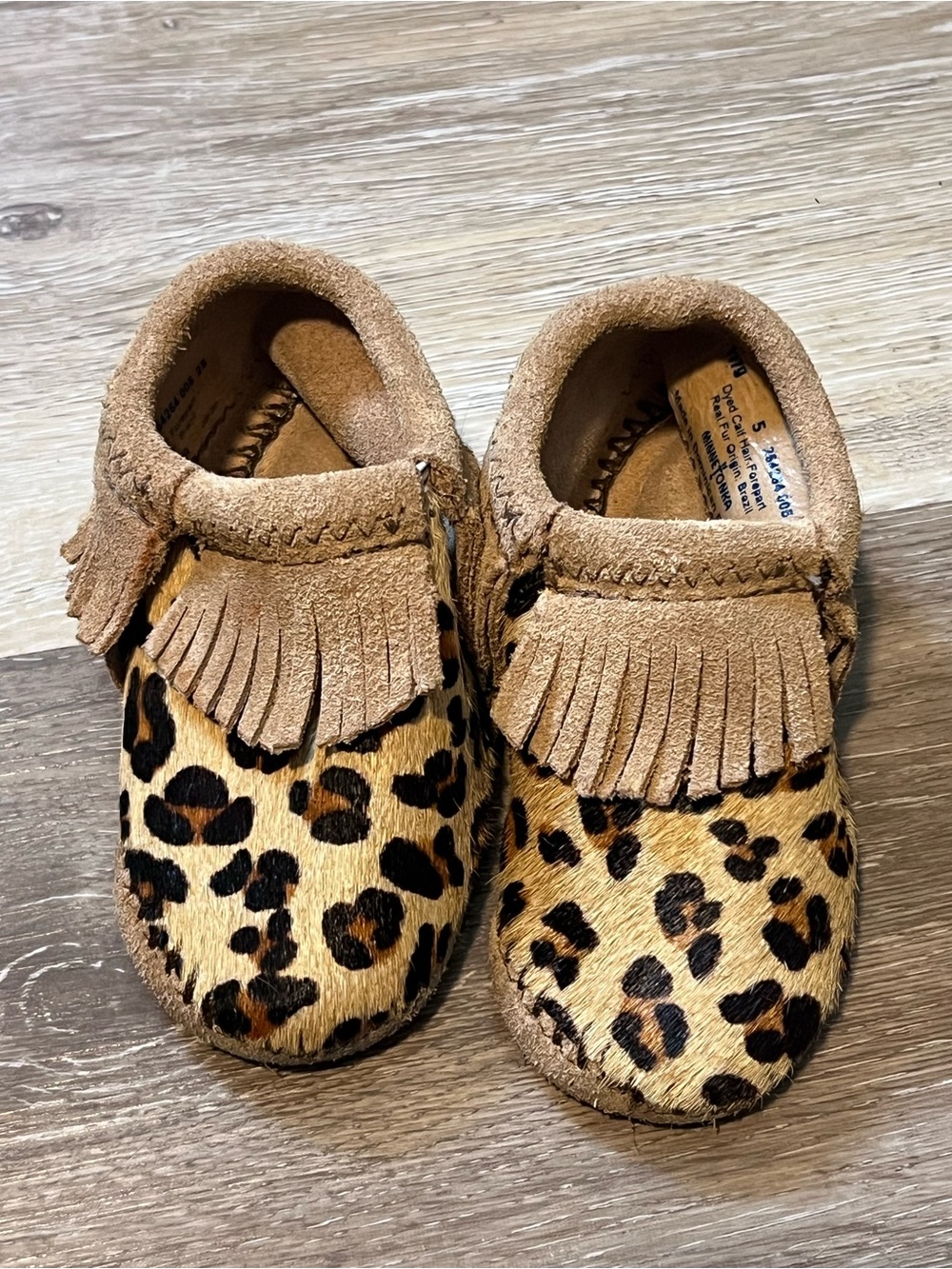 Minnetonka • size 5 • leather Kids Leopard Print Fringe Moccasin Slip-Ons - Tan